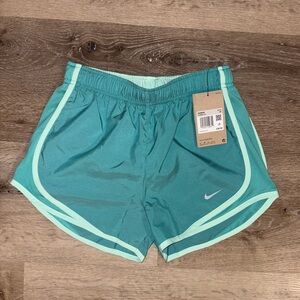 Nike Women’s Tempo Dri-FIT Midrise 3 inch running shorts in teal NWT